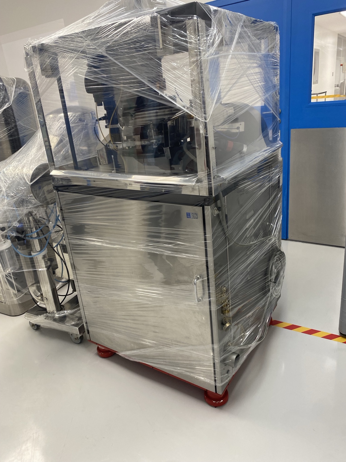 Industrial production machinery wrapped for transport